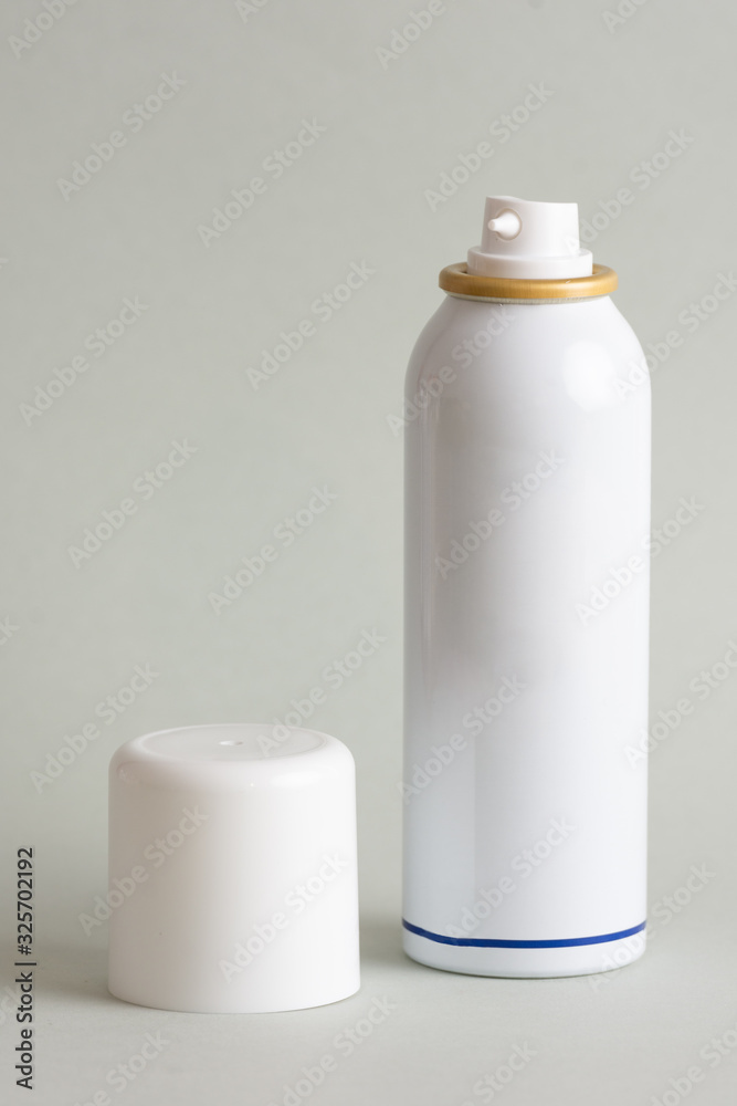 Isolated chloroethyl spray on grey background. Isolated chloroethyl spray on grey background.