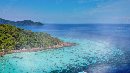 Fototapeta Naklejka Na Ścianę i Meble -  Surin Islands, Thailand. Panoramic aerial view of lagoon and forest on a sunny day