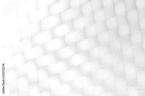 Abstract white and gray bokeh lights background with blur texture