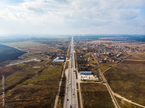 View from the drone of the asphalt road to the city. Ukraine.