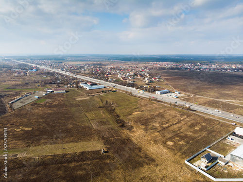 View from the drone of the asphalt road to the city. Ukraine.