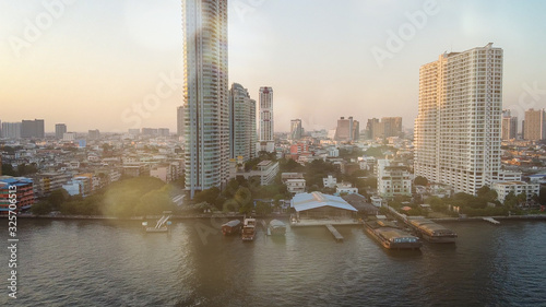 Bangkok, Thailand. Sunset aerial view of Asiatique Riverfront with cityscape and Chao Phraya River