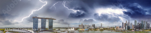 Panoramic aerial view of Singapore skyline during a storm