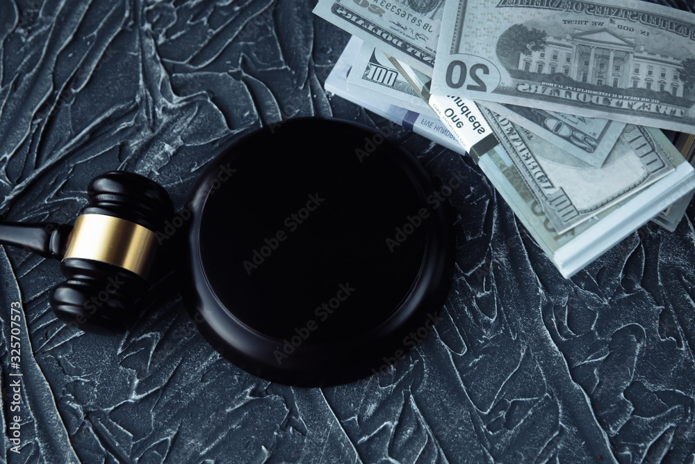 Fototapeta premium Judge Gavel, Scale Of Justice With USa Dollars And Law Book On Judges Table In Courtroom. Conceptual Image To Illustration Bail, Bankruptcy, Fee, Tax, Fraud, Monetary Penalty, Fine And Financial Fraud