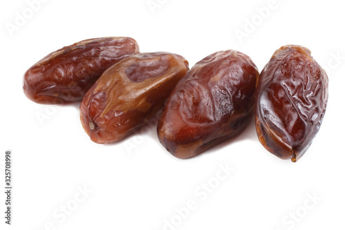 Date fruits isolated on white
