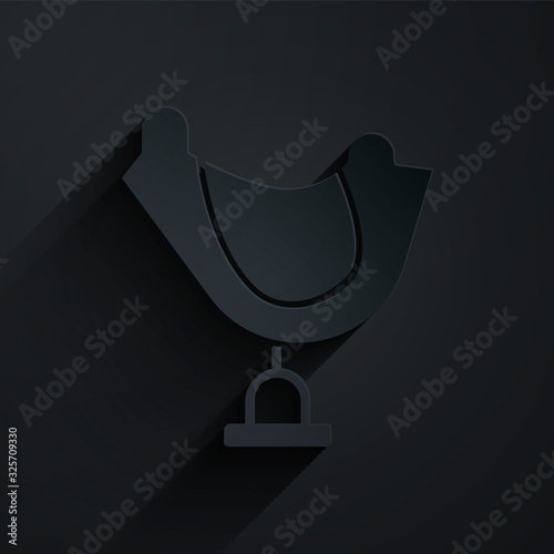 Paper cut Wild west saddle icon isolated on black background. Paper art style. Vector Illustration