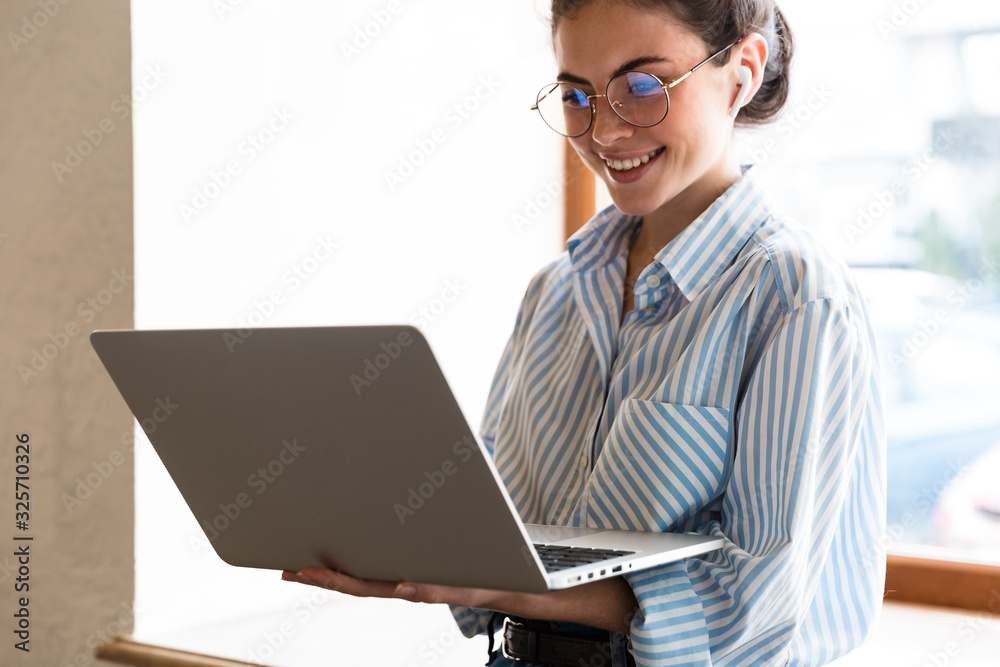Smiling young attractive brunette businesswoman Smiling young attractive brunette businesswoman