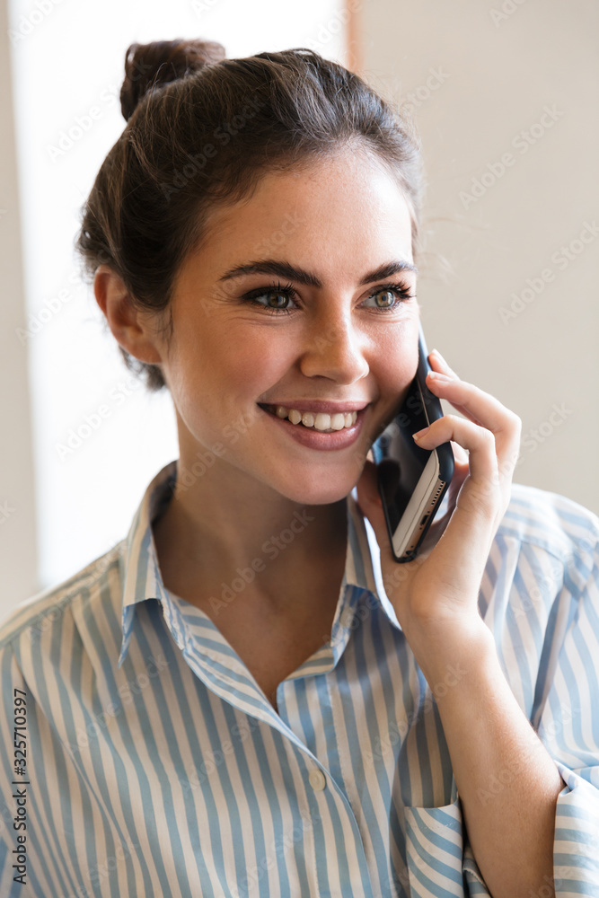 Attractive smiling young brunette businesswoman Attractive smiling young brunette businesswoman