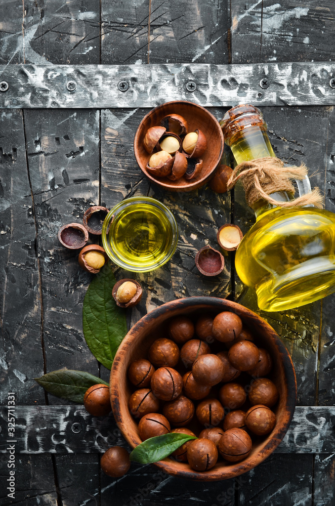 Vegan oil. Macadamia nut oil. Top view. Free space for your text. Vegan oil. Macadamia nut oil. Top view. Free space for your text.