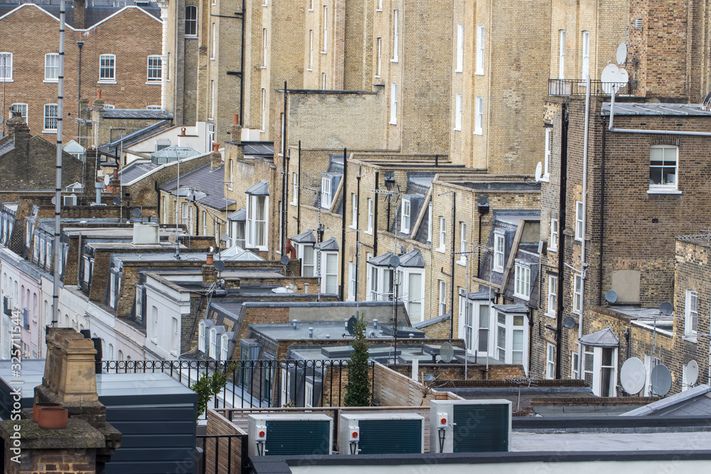 Inner city London town housing. Packed backstreet building roof tops.