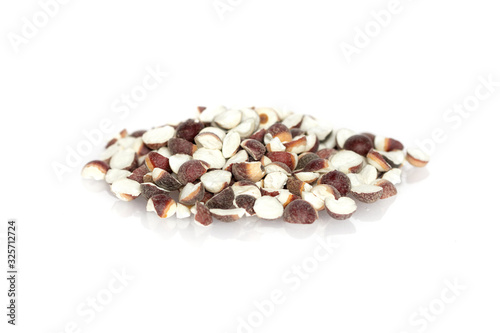Chinese herbal - Qian Shi: Euryale ferox, prickly waterlily, fox nut, foxnut, gorgon nut, makhana) over the white background. Qian Shi is believed to stabilize, tonify spleen and Kidneys energy. photo