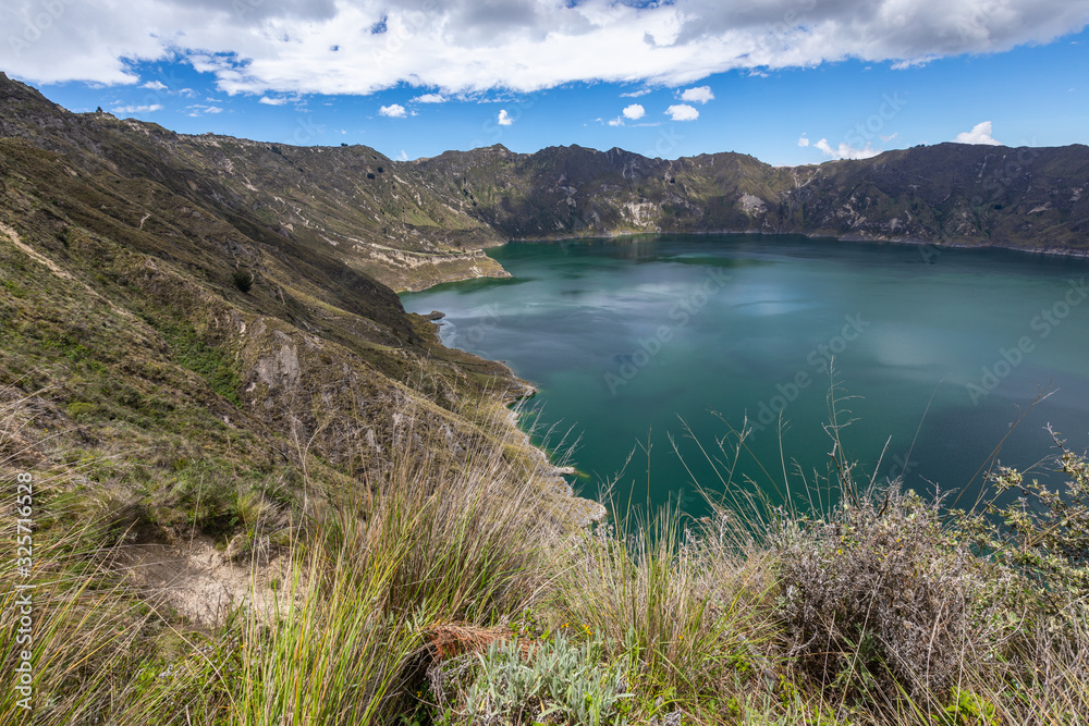 Lake Quilotoa. Panorama of the turquoise volcano crater lagoon of Quilotoa, near Quito, Andean region of Ecuador.