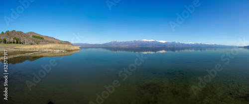 Blue Lake with mountain reflection - Prespa Lake  Macedonia - Panoramic photo