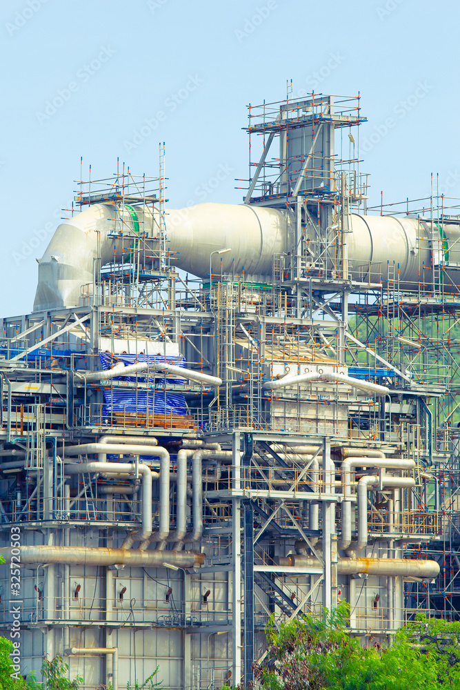 Oil refinery plant and industrial factory building construction from engineering technology and steel material such as steel structure, metal, valve control, pipe, pipeline for transport oil and gas. Oil refinery plant and industrial factory building construction from engineering technology and steel material such as steel structure, metal, valve control, pipe, pipeline for transport oil and gas.