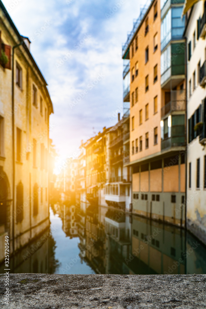 Romantic landmark street cityscape with tourist attraction small lovely town village in Europe italy with narrow ally old historical architecture houses buildings background with canals and bridge