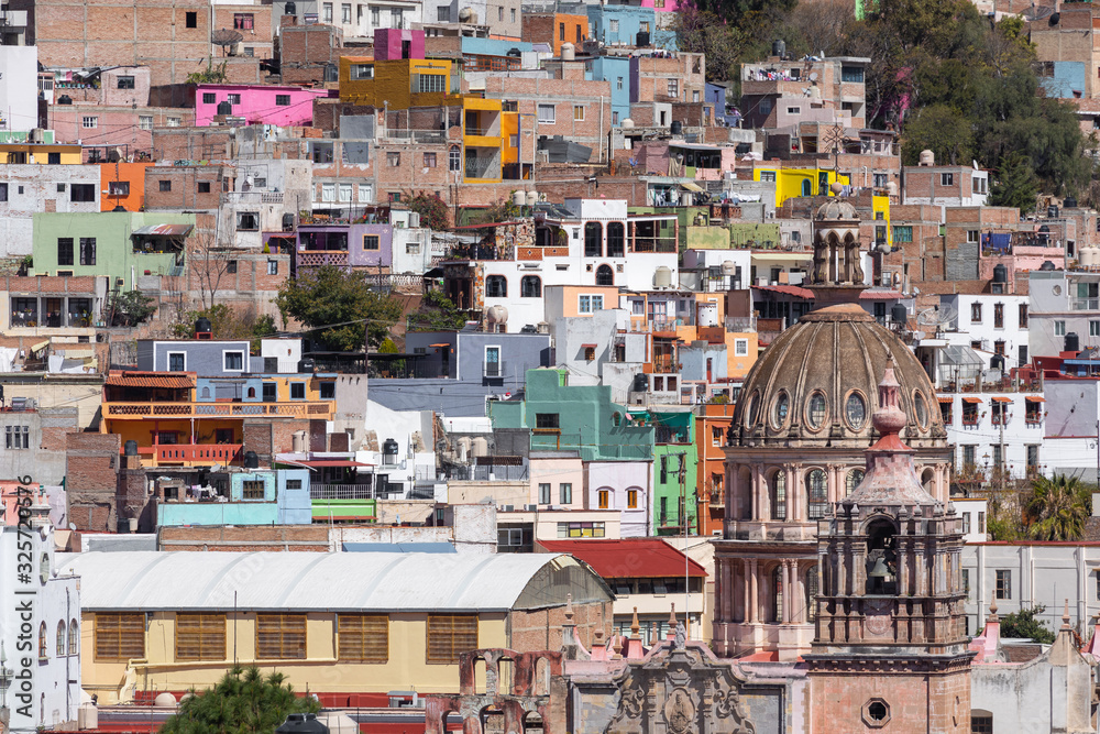 Guanajuato City historic center. Colorful homes built on hillside. Guanajuato State, Mexico.