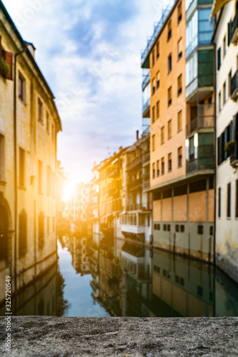 Fototapeta Naklejka Na Ścianę i Meble -  Romantic landmark street cityscape with tourist attraction small lovely town village in Europe italy with narrow ally old historical architecture houses buildings background with canals and bridge