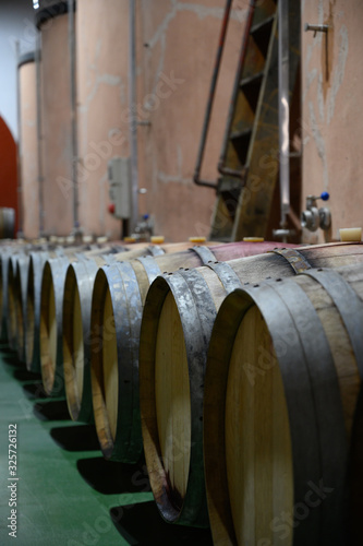 Traditional winery bodega on south of La Palma island with steel or concrete casks and wooden barrels in wine cellars, wine production on Canary Islands, Spain © barmalini