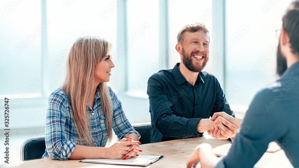 managers ask questions to the applicant during the interview