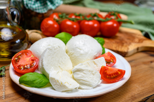 Cheese collection, white italian mozzarella cheese balls for salad or for appetizer snacks from deli shop in New York, USA