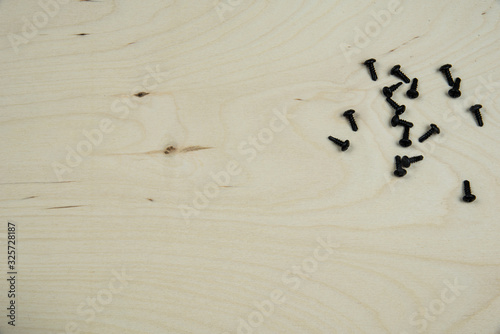 screws on wooden panel photo photo