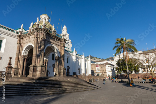 QUITO, ECUADOR - FEBRUARY 07, 2020: Plaza Grande and Metropolitan Cathedral, historic colonial downtown of Quito, Ecuador. South America.