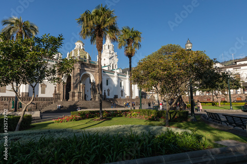 QUITO, ECUADOR - FEBRUARY 07, 2020: Plaza Grande and Metropolitan Cathedral, historic colonial downtown of Quito, Ecuador. South America.