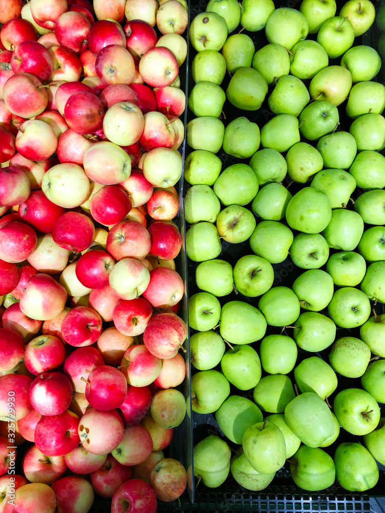 Many apples on street market counter Many apples on street market counter