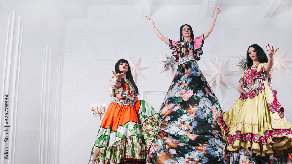 Obraz premium Gypsy dance group performing at the festival of folk art.