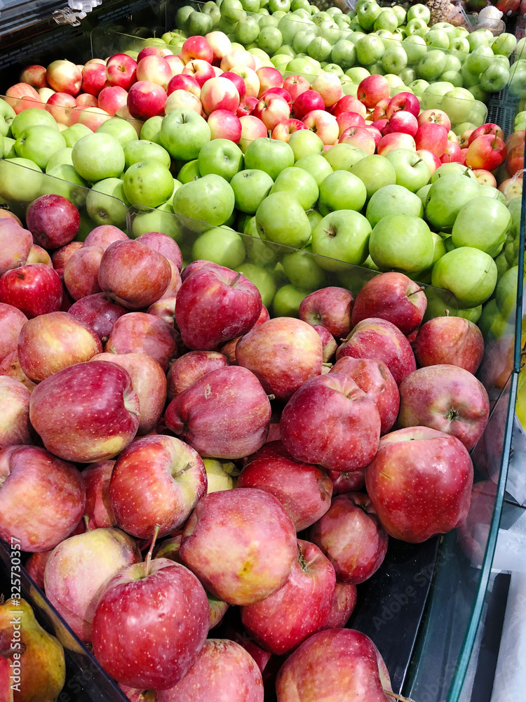 Many apples on street market counter Many apples on street market counter