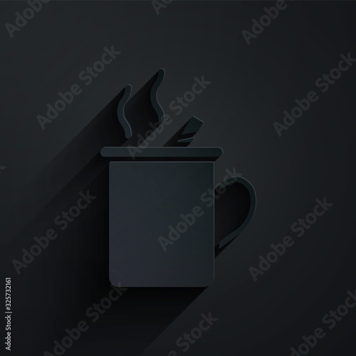 Paper cut Mulled wine with glass of drink and ingredients icon isolated on black background. Cinnamon stick, clove, lemon slice. Paper art style. Vector Illustration