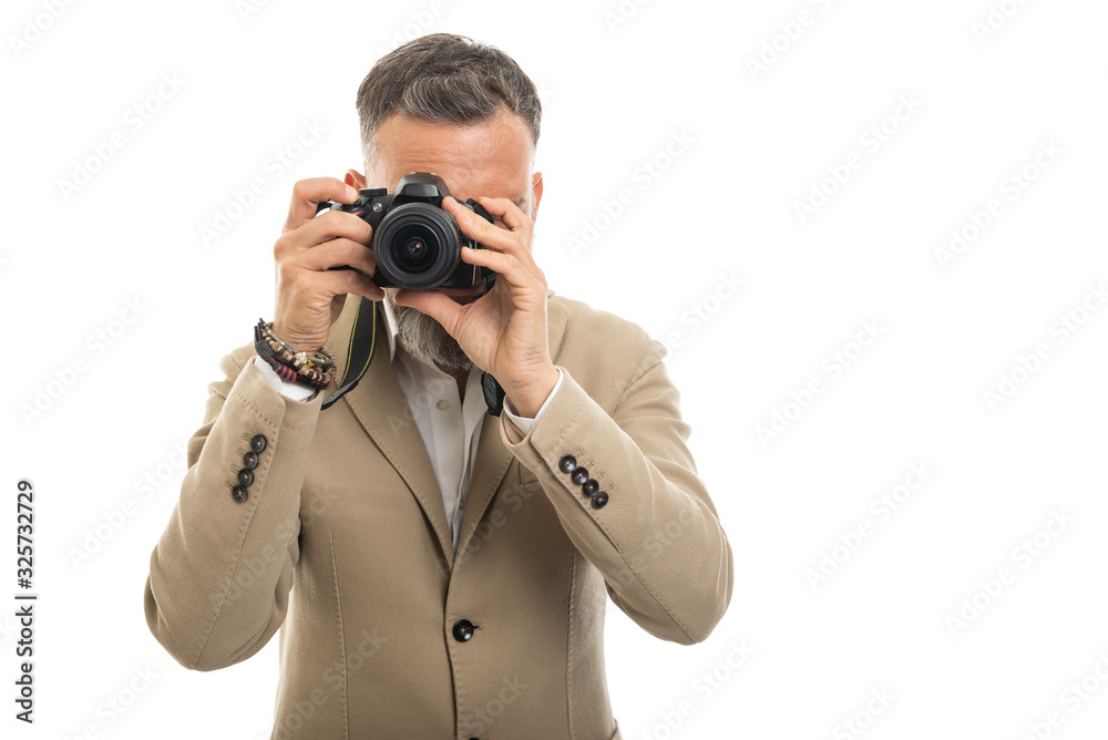 Photographer wearing smart casual clothes taking picture Photographer wearing smart casual clothes taking picture