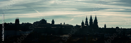 Wide Panoramic view of Santiago de Compostela. Silhouetted skyline of Compostela old town