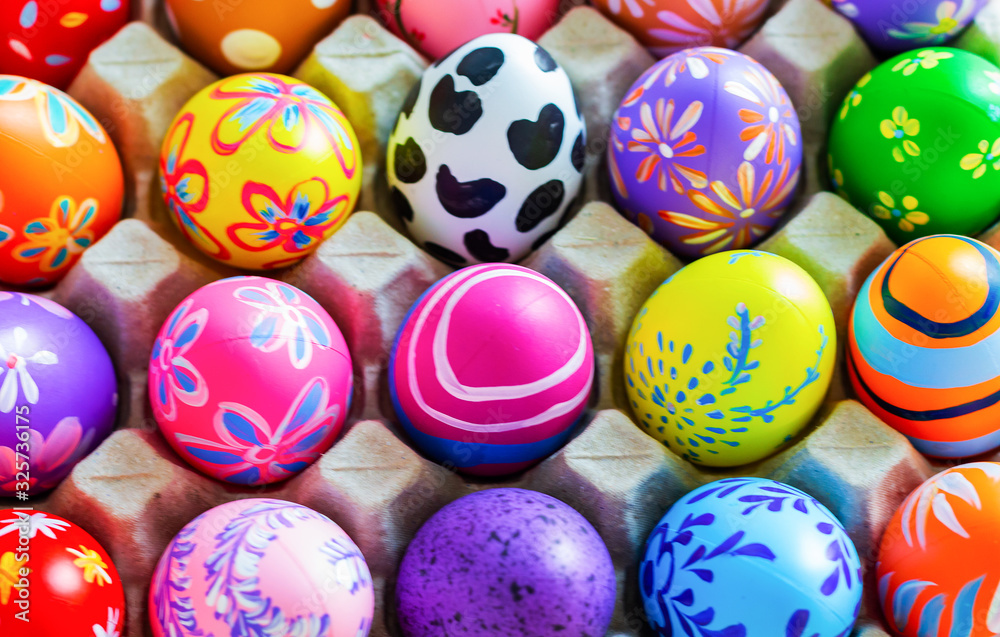 Colorful eggs for Easter on the background