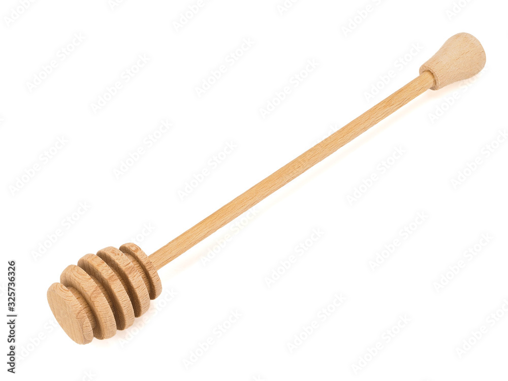 Wooden dipper for honey isolated on a white background