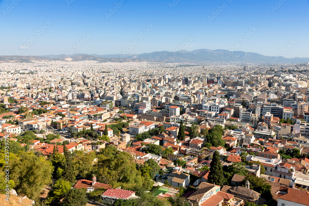 View of Athens from Acropolis. Famous places in Athens - capital of Greece. Ancient monuments. View of Athens from Acropolis. Famous places in Athens - capital of Greece. Ancient monuments.