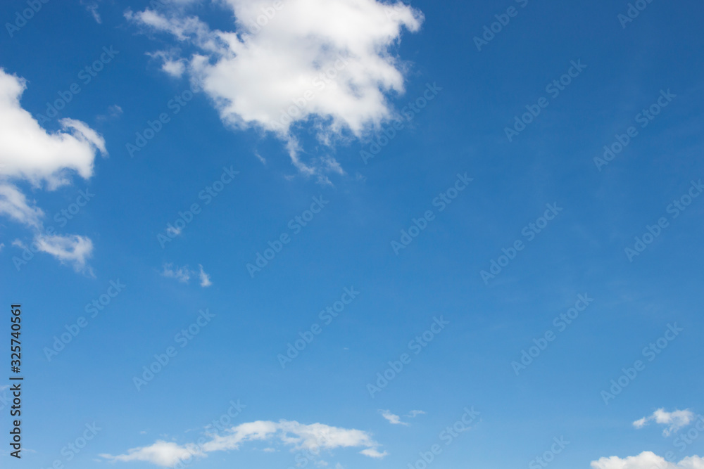 Bright blue sky with white clouds for background or wallpapers Bright blue sky with white clouds for background or wallpapers