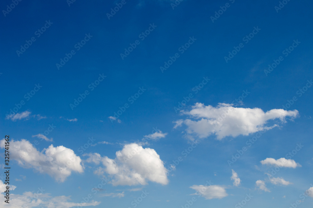 Bright blue sky with white clouds for background or wallpapers Bright blue sky with white clouds for background or wallpapers