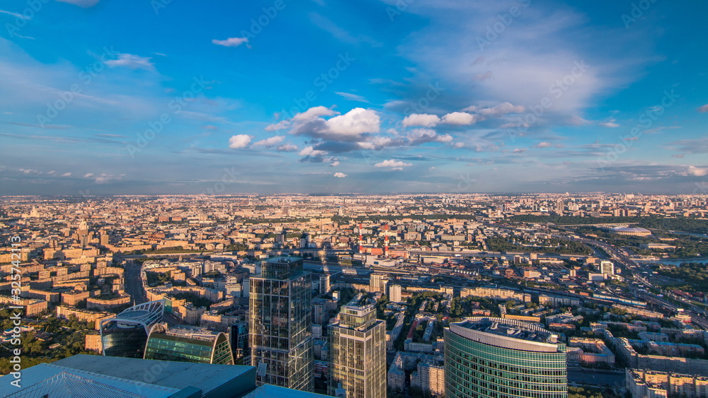 Aerial top view of Moscow city timelapse at sunset. Form from the observation platform of the business center of Moscow City.