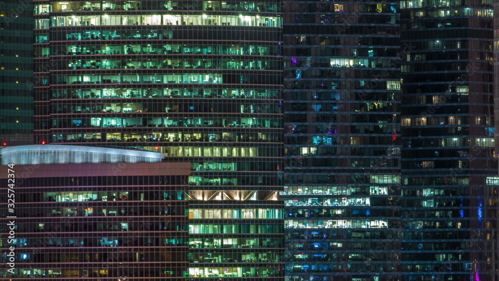 Modern office building with glowing windows at night timelapse. Moscow city Modern office building with glowing windows at night timelapse. Moscow city