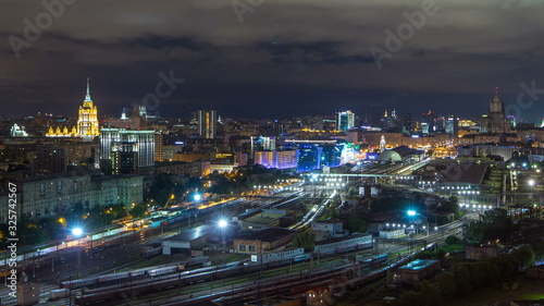 Nighttime panoramic view to Kiev Railway Station timelapse and modern city in Moscow, Russia