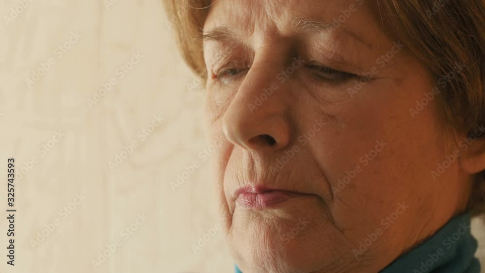 face of cute grandmother reading a book in the evening at home in room, elderly people lifestyle,granny leisure face of cute grandmother reading a book in the evening at home in room, elderly people lifestyle,granny leisure