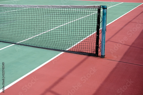 tennis playground at bright sunny day with copy space 
