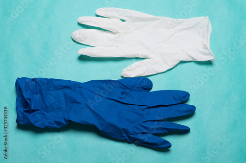 Surgical gloves. Medical glove on a blue background.