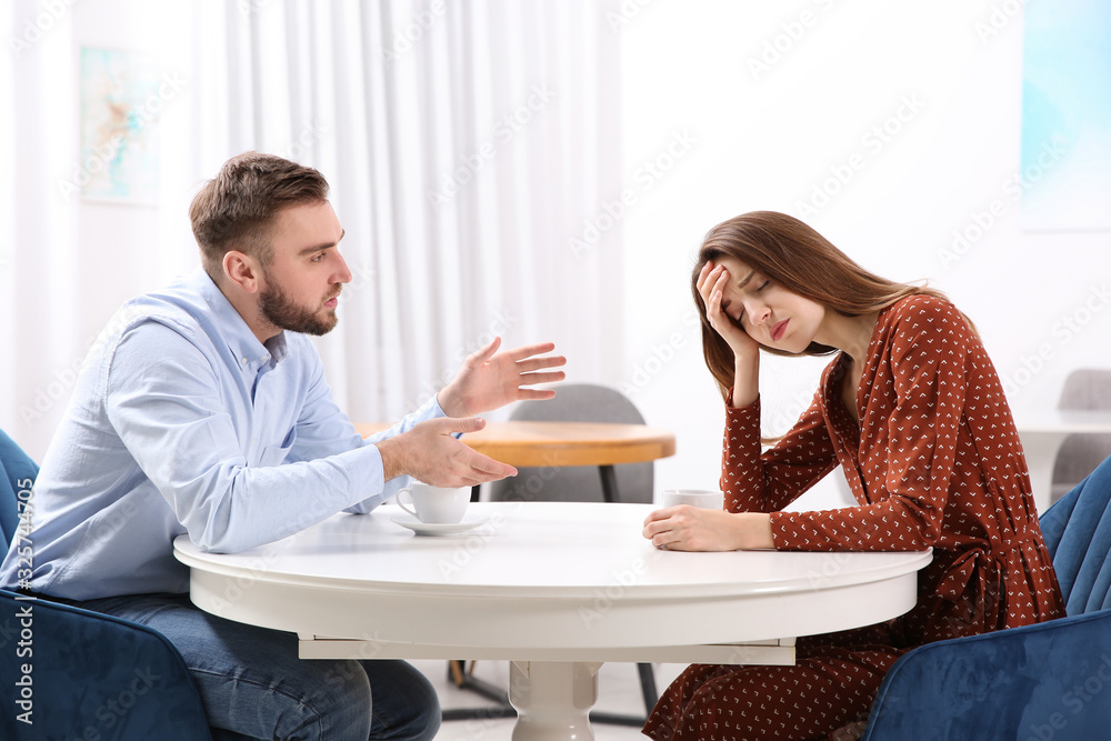 Couple having quarrel in cafe. Relationship problems Couple having quarrel in cafe. Relationship problems