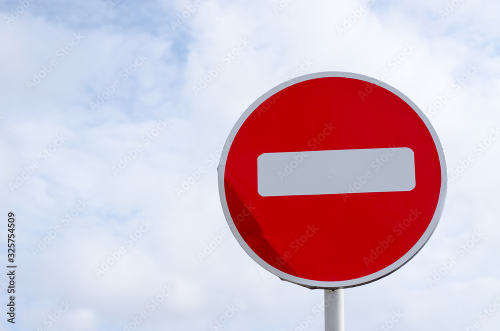 no entry road sign on sky background with clouds no entry road sign on sky background with clouds