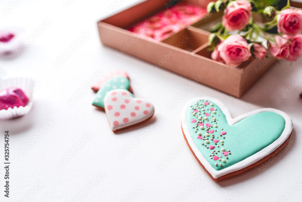 Fototapeta premium Gift set with hand made sweets in a box on a white table. Flat lay, top view.