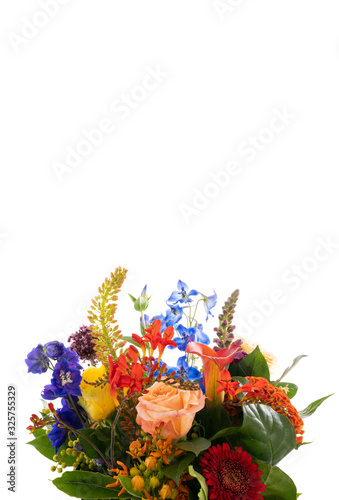 Bouquet with a variety of summer flowers against white. Empty space, room for text.