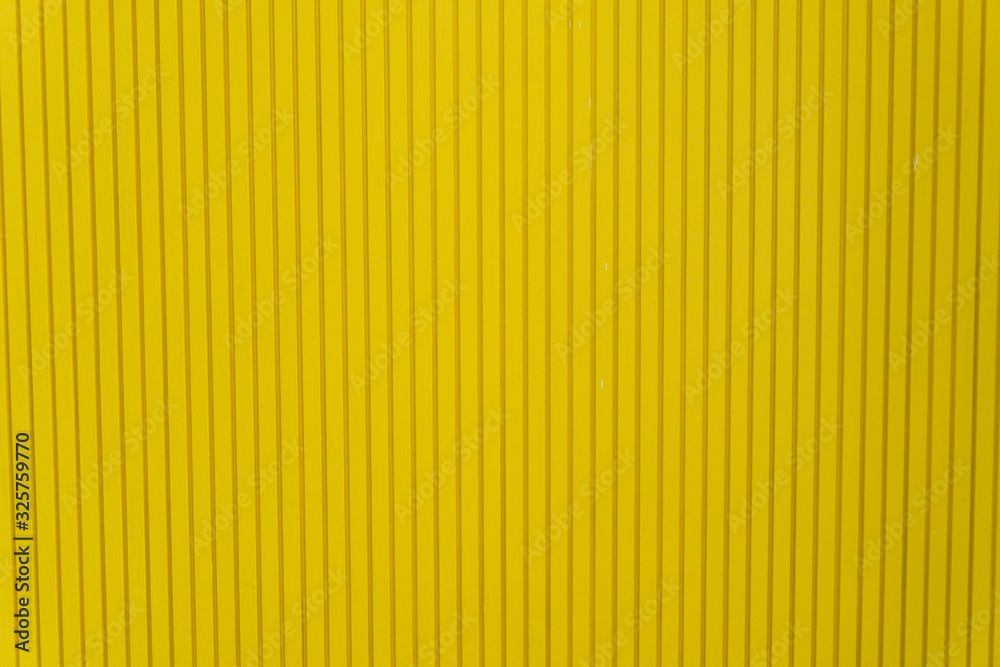 Yellow pattern Vertical straight line background with copy space Yellow pattern Vertical straight line background with copy space