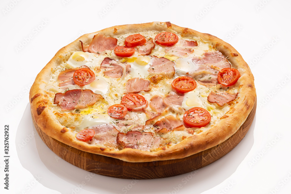 Pizza with bacon, cheese, egg and tomatoes isolated on white background.